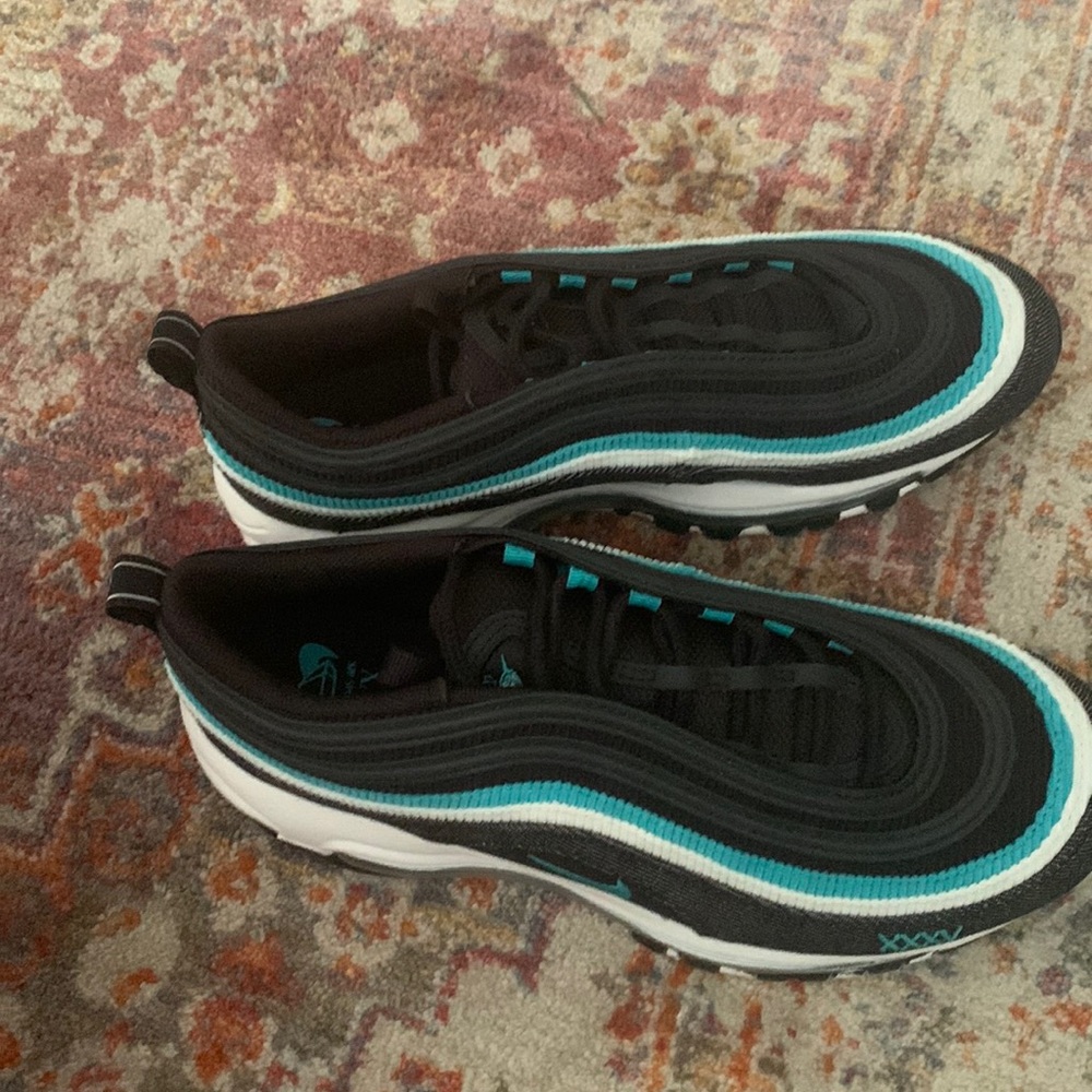 Nike air max black with blue and white stripe. Size 6.5 men’s or 8.5 women’s